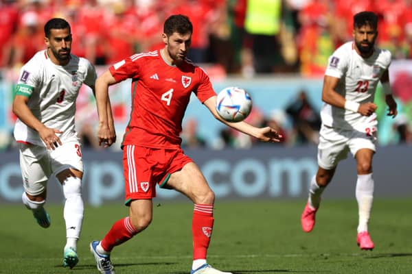  Ben Davies of Wales controls the ball during the FIFA World Cup Qatar 2022 Group B match between Wales and IR Iran  (Photo by Clive Brunskill/Getty Images)