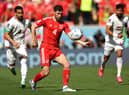  Ben Davies of Wales controls the ball during the FIFA World Cup Qatar 2022 Group B match between Wales and IR Iran  (Photo by Clive Brunskill/Getty Images)