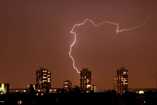 Lightning flashes in the night sky over South London August 07, 2008