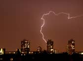 Lightning flashes in the night sky over South London August 07, 2008 