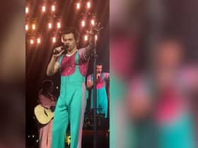 Video footage shows Harry Styles asking the crowd to move back slowly to stop fans being crushed against the handrails.