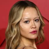 British singer songwriter Rita Ora poses on the red carpet upon arrival at The 2022 Fashion Awards in London on December 5, 2022.  (Photo by Daniel LEAL / AFP) 