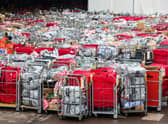 Letter and parcels pile up outside the Royal Mail centre in Bristol. Due to the postal strike along with the busy festive period lots of cages are seen outside the mail centre. Many of these parcels have been left outside for at least 17 hours.