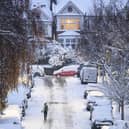 A man jogs along an icy road in London (Getty Images)
