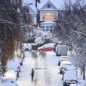 A man jogs along an icy road in London (Getty Images)