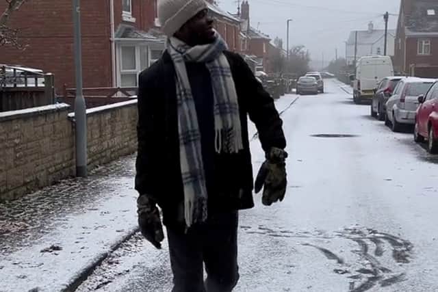 A man was left giddy with excitement and emotional after seeing snow for the first time ever. Photo: Jaima Bako/ SWNS