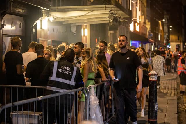 Club-goers queue outside Fabric nightclub. Photo: Getty