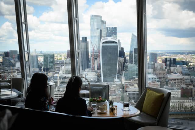 Guests enjoy their meals at the Tang restaurant within the Shangri-La Hotel at The Shard. Photo: Getty