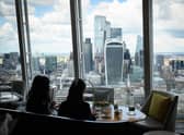 Guests enjoy their meals at the Tang restaurant within the Shangri-La Hotel at The Shard. Photo: Getty