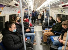 Commuters on the London Underground. Credit: SWNS
