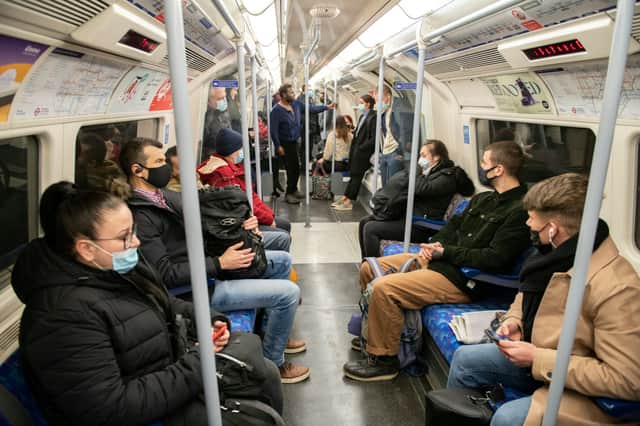 Commuters on the London Underground. Credit: SWNS