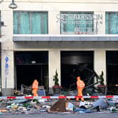 Berlin’s AquaDom aquarium containing 1,500 tropical fish bursts causing major flooding on nearby streets.