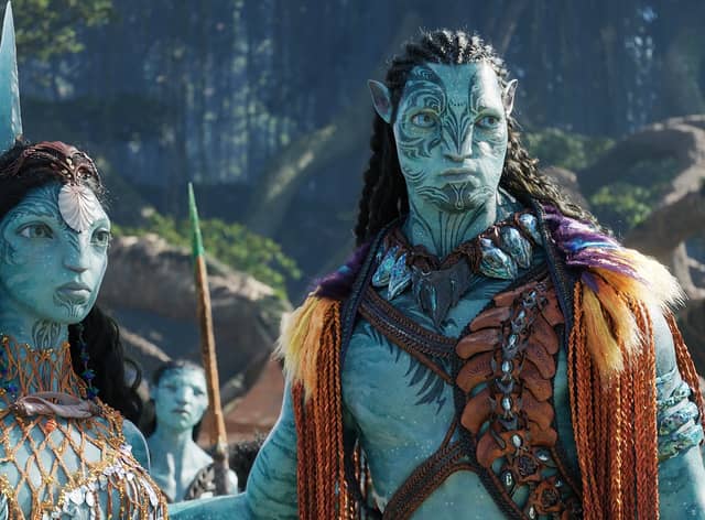 Ronal (Kate Winslet), Tonowari (Cliff Curtis), and the Metkayina Clan (Photo: © 2022 20th Century Studios)