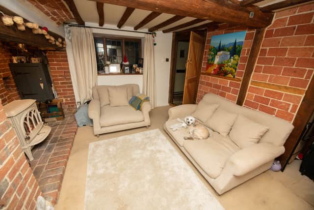 Cosy cream sofas in the living room. Photo: SWNS