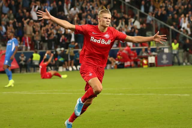 Salzburg's Norwegian forward Erling Braut Haland celebrate scoring during the UEFA Champions League Group E  (Photo credit should read KRUGFOTO/AFP via Getty Images)