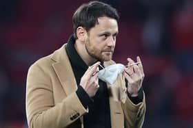 RB Leipzig technical director Christopher Vivell enters the pitch prior to the German first division Bundesliga football match between RB Leipzig and FC Cologne