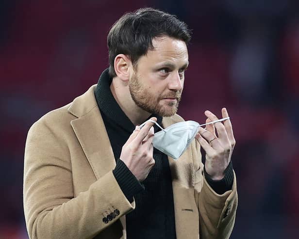 RB Leipzig technical director Christopher Vivell enters the pitch prior to the German first division Bundesliga football match between RB Leipzig and FC Cologne