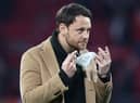 RB Leipzig technical director Christopher Vivell enters the pitch prior to the German first division Bundesliga football match between RB Leipzig and FC Cologne