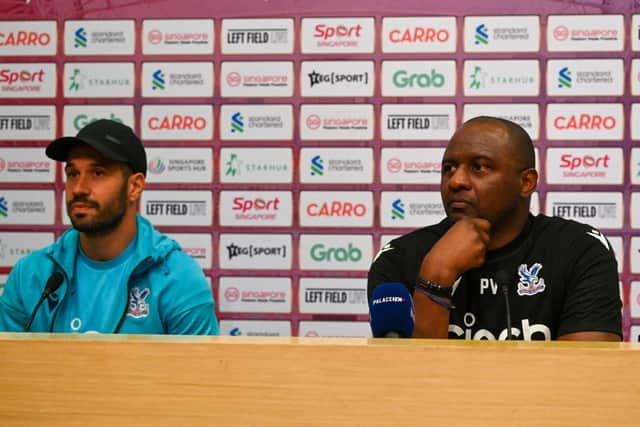 Crystal Palace FC manager Patrick Vieira ((R) and team captain Luka Milivojevic attend a press conference at the National Stadium (Photo by ROSLAN RAHMAN/AFP via Getty Images)