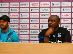 Crystal Palace FC manager Patrick Vieira ((R) and team captain Luka Milivojevic attend a press conference at the National Stadium (Photo by ROSLAN RAHMAN/AFP via Getty Images)