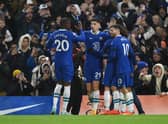  Kai Havertz of Chelsea celebrates after scoring their side's first goal with Denis Zakaria and Christian Pulisic during the Premier League match