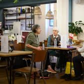 Elderly people at a London “warm bank”, where people can socialise, work and rest without worrying about heating their homes during the winter months. Photo: Getty