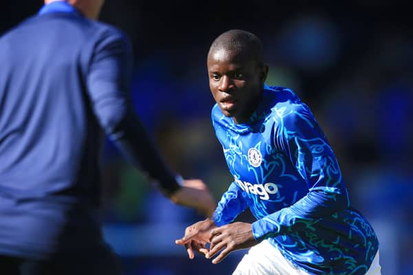 N'Golo Kante reacts as he warms up prior to the English Premier League football match between Everton and Chelsea at Goodison Park