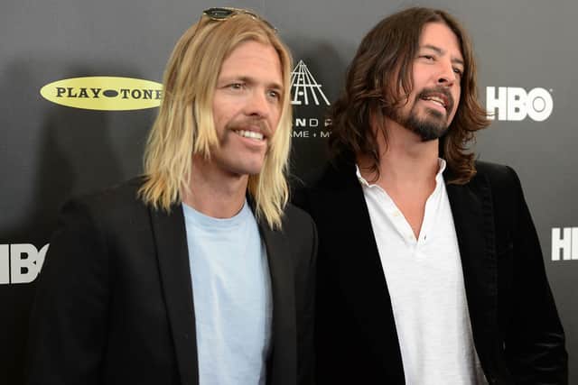  Musicians Taylor Hawkins and Dave Grohl of Foo Fighters arrive at the 28th Annual Rock and Roll Hall of Fame Induction Ceremony. The band confirmed in their New Year’s message they will continue despite Hawkins’ death 