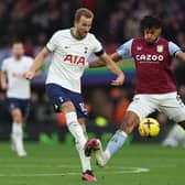 Tottenham Hotspur’s  Harry Kane (L) vies with Aston Villa defender Tyrone Mings (R) during the Premier League match between Tottenham Hotspur and Aston Villa at Tottenham Hotspur Stadium 