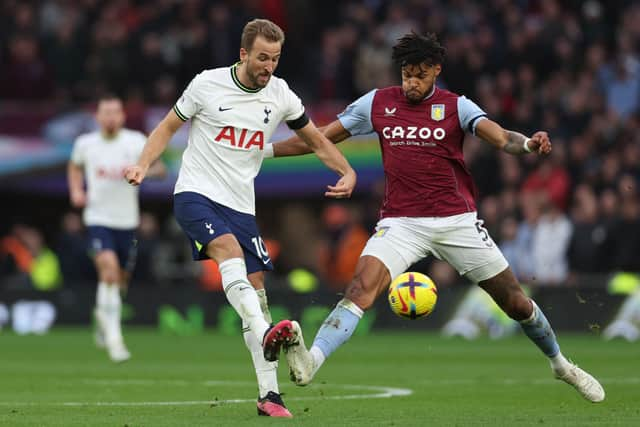 Tottenham Hotspur’s  Harry Kane (L) vies with Aston Villa defender Tyrone Mings (R) during the Premier League match between Tottenham Hotspur and Aston Villa at Tottenham Hotspur Stadium 