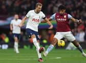 Tottenham Hotspur’s  Harry Kane (L) vies with Aston Villa defender Tyrone Mings (R) during the Premier League match between Tottenham Hotspur and Aston Villa at Tottenham Hotspur Stadium 