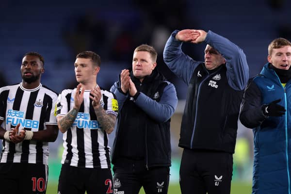 (L) Allan Saint-Maximin, Kieran Trippier (2L) and Eddie Howe (C), Manager of Newcastle United applauds fans following their side's victory
