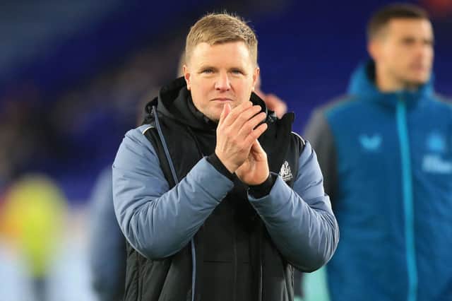 Newcastle United’s English head coach Eddie Howe applauds supporters on the pitch after the English Premier League football match (Photo by LINDSEY PARNABY/AFP via Getty Images)