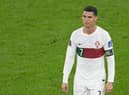 Cristiano Ronaldo leaves the field after losing to Morocco 1-0 in the Qatar 2022 World Cup quarter-final football match between Morocco and Portugal