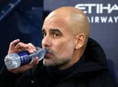 Pep Guardiola, Manager of Manchester City, looks on prior to the Premier League match between Manchester City  (Photo by Jan Kruger/Getty Images)