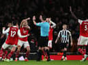 Arsenal players appeal to Referee Andy Madley during the English Premier League football match between Arsenal and Newcastle United at the Emirates Stadium