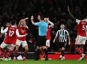 Arsenal players appeal to Referee Andy Madley during the English Premier League football match between Arsenal and Newcastle United at the Emirates Stadium