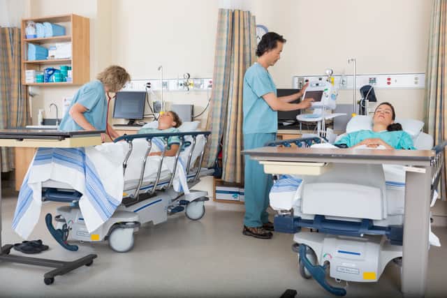 Nurses caring for patients in post operative care ward. Photo: AdobeStock