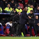 Antonio Conte, Manager of Tottenham Hotspur embraces Patrick Vieira, Manager of Crystal Palace, after the Premier League match 