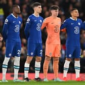 Chelsea players pay tribute to Brazilian football legend Pele, who died on December 29, 2022 ahead of the  during the English Premier League football match