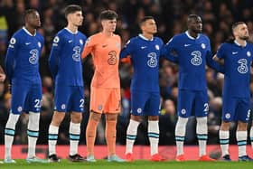 Chelsea players pay tribute to Brazilian football legend Pele, who died on December 29, 2022 ahead of the  during the English Premier League football match