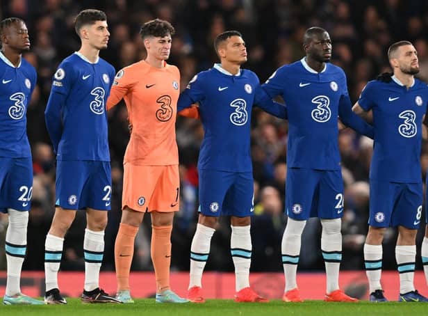 <p>Chelsea players pay tribute to Brazilian football legend Pele, who died on December 29, 2022 ahead of the  during the English Premier League football match</p>