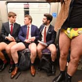 People take part in the annual 'No Trousers On The Tube Day'