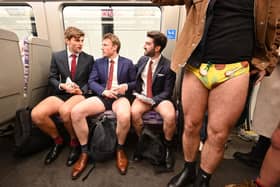 People take part in the annual 'No Trousers On The Tube Day'