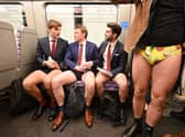 People take part in the annual 'No Trousers On The Tube Day'