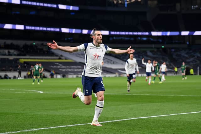 Gareth Bale of Tottenham Hotspur  celebrates after scoring his second goal during the Premier League  (Photo by Shaun Botterill/Getty Images)