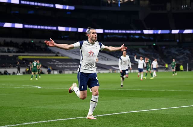 Gareth Bale of Tottenham Hotspur  celebrates after scoring his second goal during the Premier League  (Photo by Shaun Botterill/Getty Images)