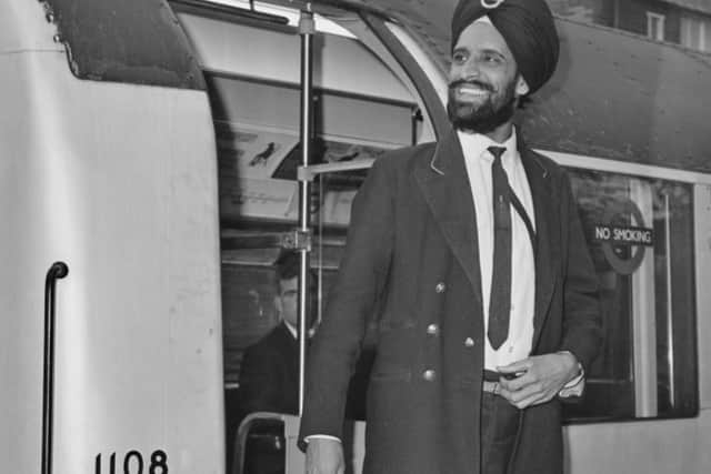 Amar Singh proudly wearing his turban, complete with London Transport roundel pin badge.