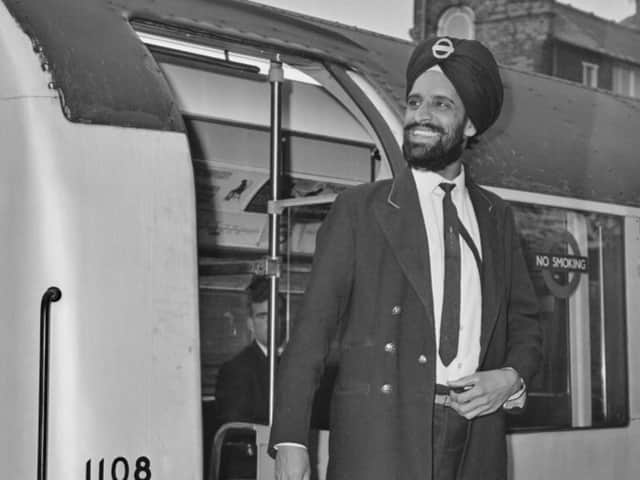 Amar Singh proudly wearing his turban, complete with London Transport roundel pin badge.