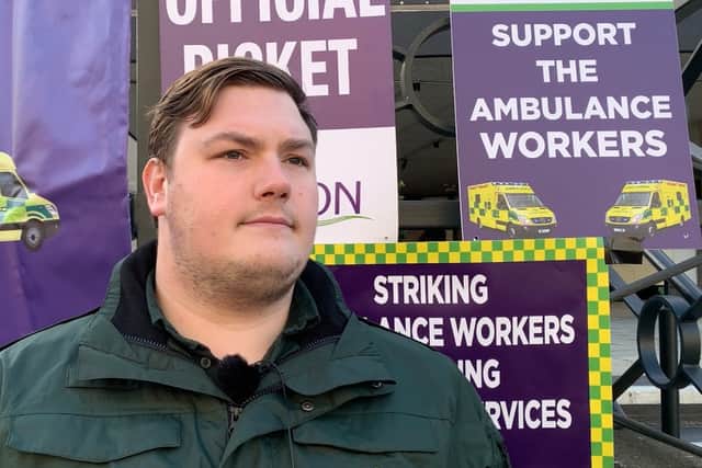 Scott, an NHS emergency medical technician outside Waterloo Ambulance station. Credit: Claudia Marquis